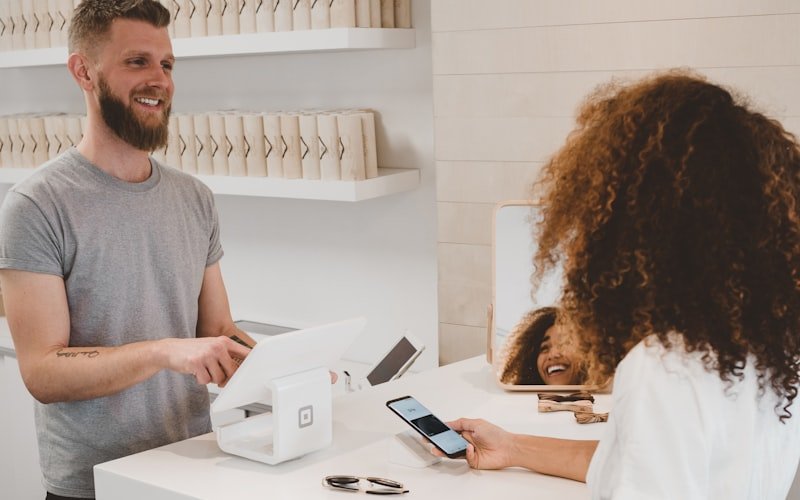 Business owner looking at competitor websites on a laptop