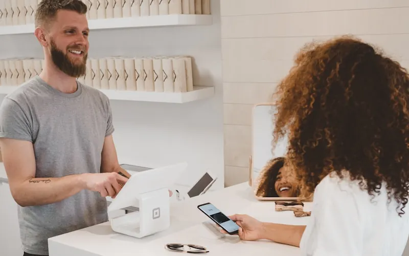 Business owner looking at competitor websites on a laptop